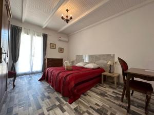 Postel nebo postele na pokoji v ubytování L'hôtel du Bastier