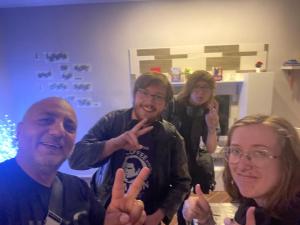 a group of people giving the peace sign with their hands at Casa Meravigliosa Fonseca in Naples