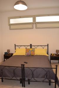 Letto o letti in una camera di Villa Rosi