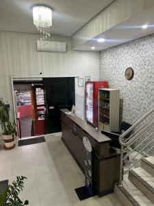 Kuchyň nebo kuchyňský kout v ubytování Shafira Hotel