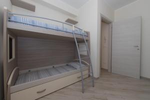 A bed or beds in a room at Serena 2 Amazing Sea View - Happy Rentals
