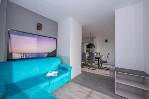 Telewizja i/lub zestaw kina domowego w obiekcie Rustichel Fantastic Lake View - Happy Rentals