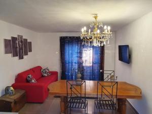 Posezení v ubytování L'hôtel du Bastier