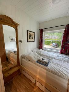 Postel nebo postele na pokoji v ubytování Guest house close to Kristiansand
