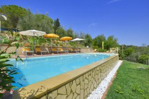 The swimming pool at or close to Casale Vittoria - Happy Rentals
