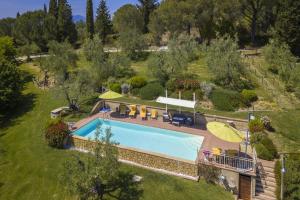 The swimming pool at or close to Casale Vittoria - Happy Rentals