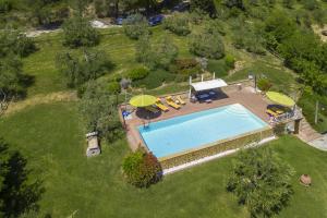The swimming pool at or close to Casale Vittoria - Happy Rentals