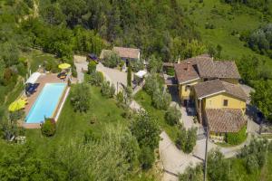 The swimming pool at or close to Casale Vittoria - Happy Rentals