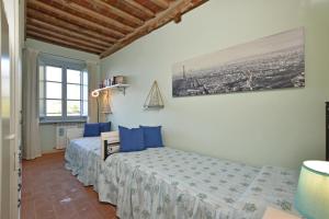 Postel nebo postele na pokoji v ubytování Alloro Grillo - Happy Rentals