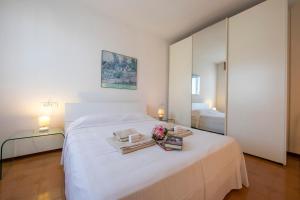 A bed or beds in a room at Casa di Paola - Happy Rentals