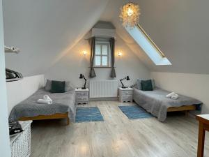 Posezení v ubytování Rose Cottage