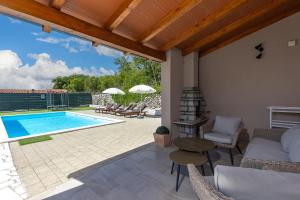 Πισίνα στο ή κοντά στο Holiday Home Asteria - Happy Rentals