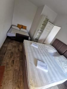 Postel nebo postele na pokoji v ubytování Apartments Bibic