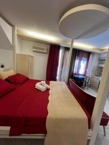 Posteľ alebo postele v izbe v ubytovaní Papyrus City Centre Apartments
