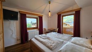 Postel nebo postele na pokoji v ubytování Absolute Active Resort Margret