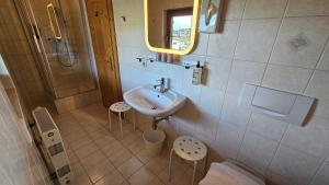 Baðherbergi á Absolute Active Resort Margret
