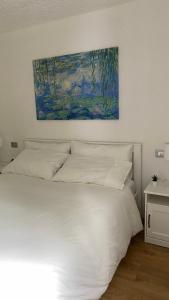 Giường trong phòng chung tại IL NIDO - Residence Sun Valley