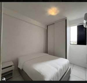 En eller flere senge i et værelse på Apt 2 Qts - Excelente Localização em Recife