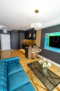 Posezení v ubytování InGalaxy Black Apartment