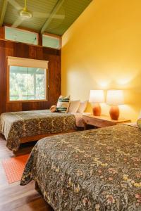 Ένα ή περισσότερα κρεβάτια σε δωμάτιο στο Mawamba Lodge