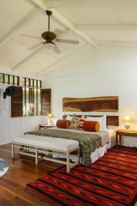 Ένα ή περισσότερα κρεβάτια σε δωμάτιο στο Mawamba Lodge
