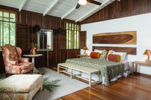 Ένα ή περισσότερα κρεβάτια σε δωμάτιο στο Mawamba Lodge