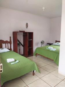 Postel nebo postele na pokoji v ubytování Posada Rural Oasis