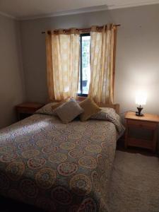 Ένα ή περισσότερα κρεβάτια σε δωμάτιο στο Cabañas villa ojen mondeña número 2
