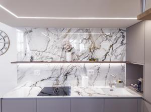 Koupelna v ubytování CASA LE 4 ARTI - 86Mq in Via Lagrange 43 LUXURY + 110 fotografií