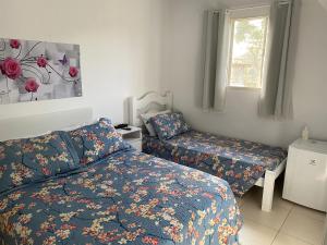 Postel nebo postele na pokoji v ubytování POUSADA RECANTO SÃO JORGE + 37 fotografií