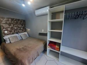 Voodi või voodid majutusasutuse Apartamento Container com pátio, vaga para carro e Split toas