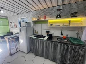 Köök või kööginurk majutusasutuses Apartamento Container com pátio, vaga para carro e Split
