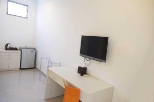 TV o dispositivi per l'intrattenimento presso Gaing Mas Residence By Gaing Mas Group