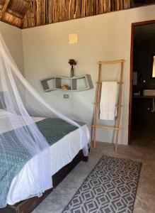 Postel nebo postele na pokoji v ubytování Casa Ik en Coba