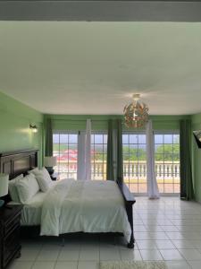 A bed or beds in a room at Seabliss Villa