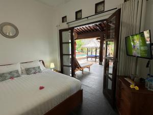 Postel nebo postele na pokoji v ubytování Bale Solah Lombok Holiday Resort + 37 fotografií