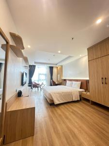 Ένα ή περισσότερα κρεβάτια σε δωμάτιο στο ATOUR Phoenix Hotel +41 φωτογραφίες