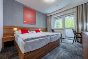 Krevet ili kreveti u jedinici u okviru objekta Hotel Jezerka