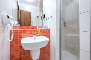 Kupatilo u objektu Hotel Jezerka