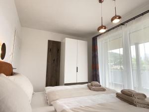 Krevet ili kreveti u jedinici u okviru objekta Local View Apartment - by myNests