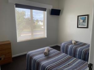 Postel nebo postele na pokoji v ubytování William Dutton Motel