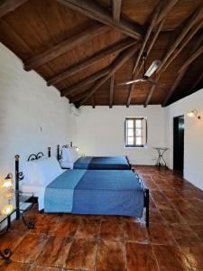 Posteľ alebo postele v izbe v ubytovaní Tsivouli Accommodation