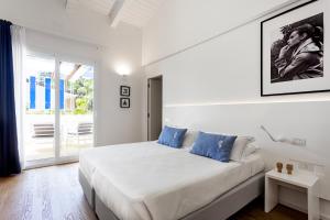 Postel nebo postele na pokoji v ubytování Calapetra Resort