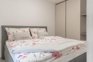 Postel nebo postele na pokoji v ubytování Apartment Gamsblick