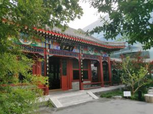 a temple in a park with a building at East Pacific Passenger Lounge - Departure area, 3rd floor in Beijing