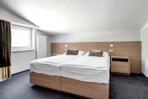 Krevet ili kreveti u jedinici u okviru objekta Hotel Jezerka