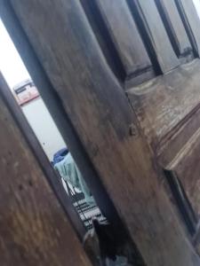 a view from the inside of a car looking down at the floor at Delta confot hostel in São Luís