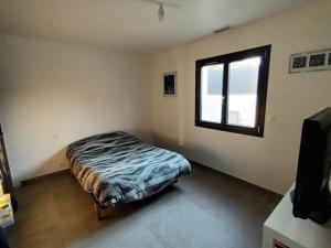 Postel nebo postele na pokoji v ubytování Villa au cœur de la Camargue avec Piscine Privative + 6 fotografií