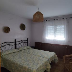 Кровать или кровати в номере Casa Rural Santa Barbara