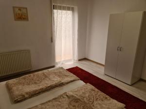 Postel nebo postele na pokoji v ubytování Ferienhaus Helene